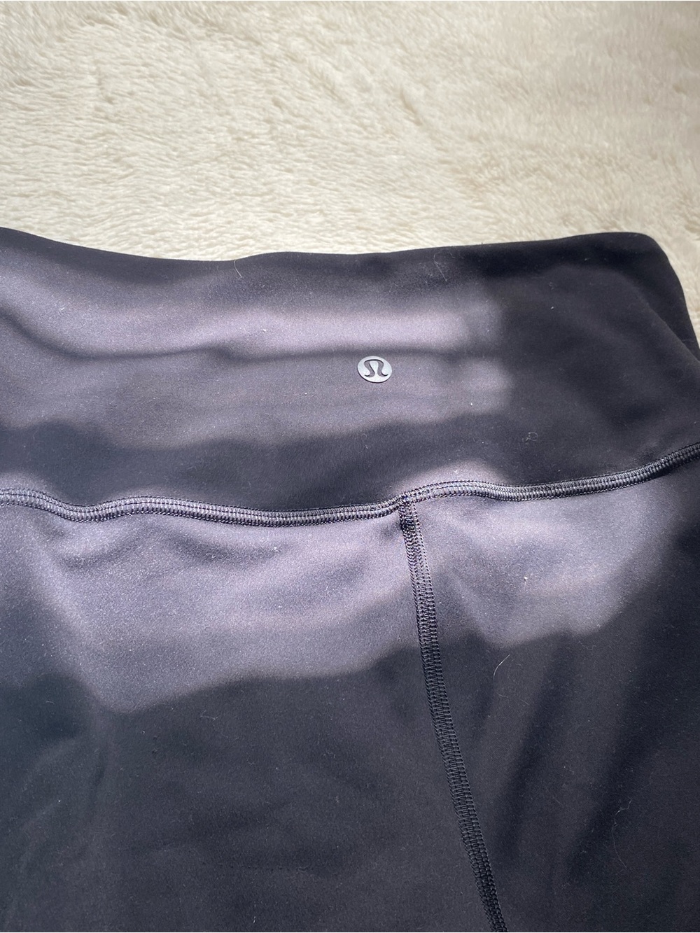 Lululemon black high-waisted, cross over Capri leggings